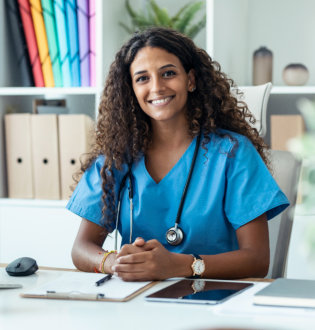 nurse smiling at the camera